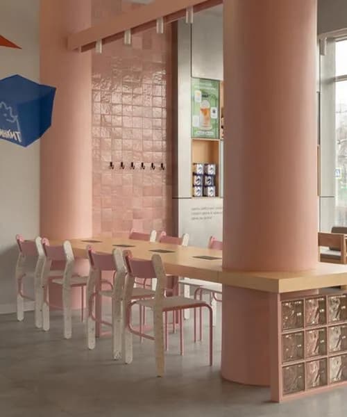 raw concrete meets marshmallow-inspired palette within drinkit flagship café